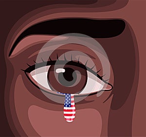 Eye of young black woman, sad for racism, who cries one tear with stars and stripes of the USA flag