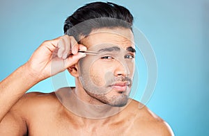 Eyebrow hair, tweezers and portrait model doing hair removal routine, beauty grooming or eyebrows maintenance treatment