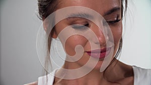 Eyebrows makeup. Woman combing eyebrow with brush closeup