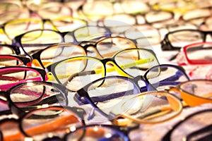 Eyeglass assortment for prescription sold at a pharmacy or optician near you. Variety of colors and styles to suit your needs and photo