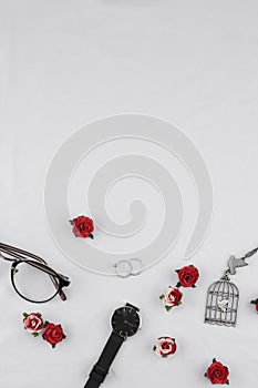 Eyeglasses, black watches, necklace and rings