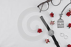 Eyeglasses, black watches, necklace and rings