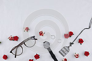 Eyeglasses, black watches, necklace and rings