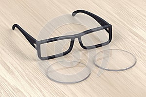 Eyeglasses frame and lens on wood table