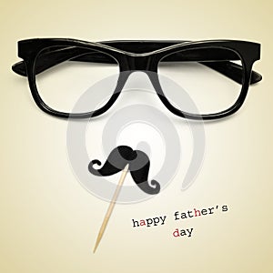 Eyeglasses and moustache, and the text happy fathers day