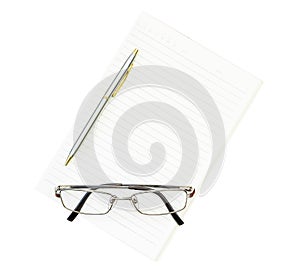 Eyeglasses and notepad on deck