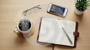 Eyeglasses a smartphone displaying the time 10 48 and a small potted