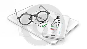 Eyeglasses, tablet and smartphone with eyesight test on screen