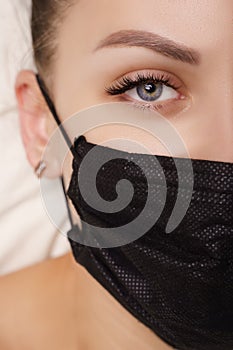 Eyelash Extension Procedure. Beautiful Woman with Extreme Long False Eyelashes. Makeup, Cosmetics. Beauty, Skincare