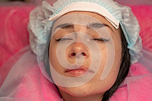 Eyelash extension procedure. Woman eye with long eyelashes. lashes, close up, macro, selective focus.