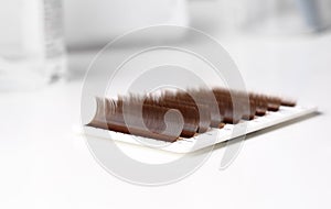 Eyelash extension tools. False eyelashes kit. Accessories for eyelash extensions. Drop of eyelash glue and curve