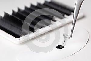 Eyelash extension tools. False eyelashes kit. Accessories for eyelash extensions. Drop of eyelash glue and curve