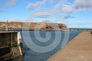 Eyemouth harbor entrance with view to North Sea