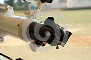The eyepiece lens is a component of refracting telescopes.
