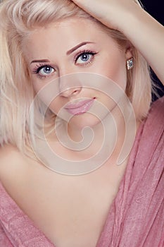 Eyes. Beauty Portrait of blond girl with white short haircut, pr
