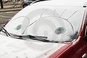 eyes drawn on the windshield of the car