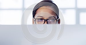 Eyes, glasses and reading business woman with a computer or digital marketing worker working on online brand ux or ui