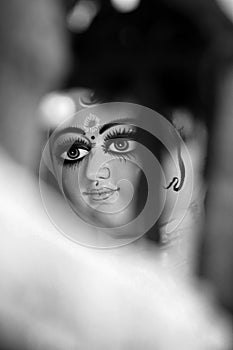 Eyes of Maa Durga. Idol of Hindu Goddess Durga during preparations in Kolkata.
