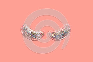 Eyes patches, glitter and glow. Use for wrinkle and dark circle under the eyes. Top view, nobody.