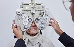 Eyes, vision exam and senior woman with optometrist in clinic for test, eyesight and optical assessment. Optometry