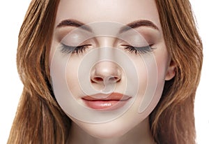 Eyes woman closed eyebrow lashes face close-up isolated on white photo