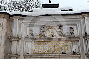 Eyup Sultan Mosque with snow in Istanbul.