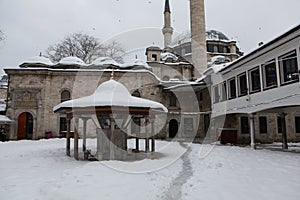 Eyup Sultan Mosque with snow in Istanbul.