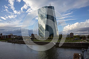 EZB Frankfurt EuropÃ¤ische Zentralbank European Central Bank cloudy blue sky with Skyline in background