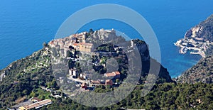 Eze village French riviera, CÃ´te d`Azur, mediterranean coast, Eze, Saint-Tropez, Cannes and Monaco. Blue water and luxury yachts.