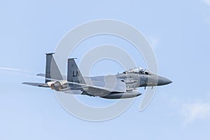 F-15E Strike Eagle trailing vapour as it climbs