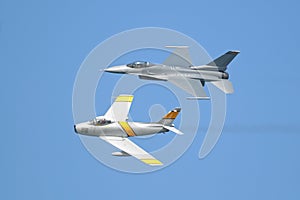 F-16 and F-86 airplanes in formation