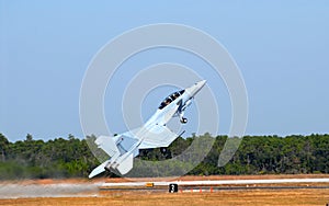 F-18 jet in a steep takeoff