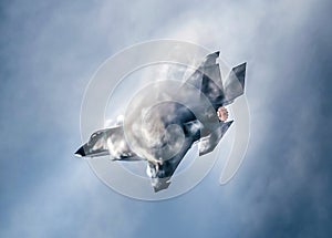 F-35 Lightning Jet producing sonic boom clouds