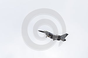 F16 falcon fighter jet on sky background