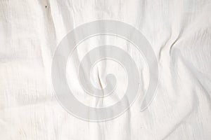 Fabric backdrop White linen canvas crumpled natural cotton fabric Natural handmade linen top view background Organic Eco textiles