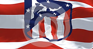 Fabric background with the flag of Atletico Madrid waving in the wind photo