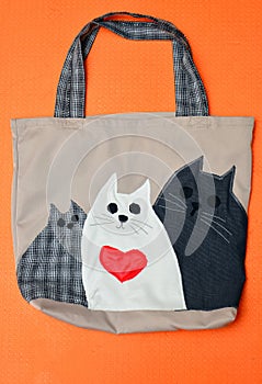 Fabric bag with applique. Funny cat snouts. Handwork.