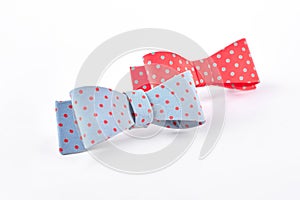 Fabric bow ties on white background.