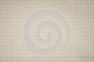 Fabric canvas woven texture background in pattern in light beige cream brown color blank. Natural gauze linen, carpet wool and