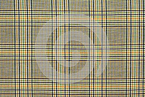 Checkered fabric. Checkered pattern on fabric of different colors. Material for clothing