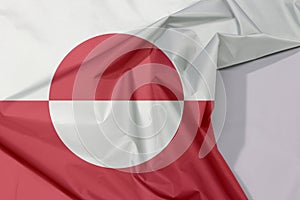 Fabric flag of Greenland fabric flag crepe and crease with white space.