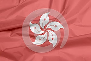 Fabric flag of Hong kong. Crease of Hong kong flag background.