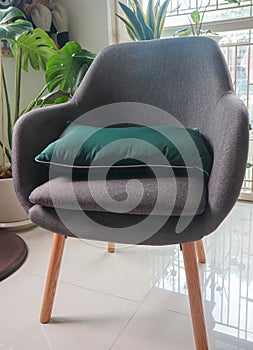 fabric grey chair in living room at modern house