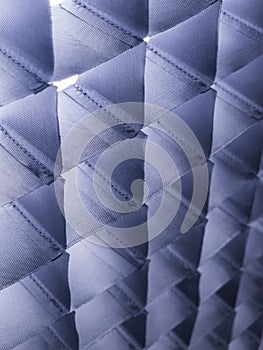 Fabric grid pattern creating geometric abstract texture