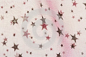 Fabric grunge christmas background with stars pattern
