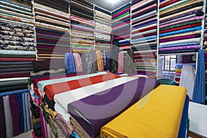 Fabric industry, textile store colorful fabric and silk. fabric background. cotton. fabrics in roll. different colors and texture