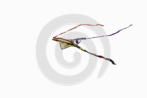 Fabric kite in flight with white background