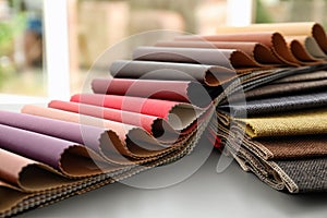 Fabric and leather samples of different colors