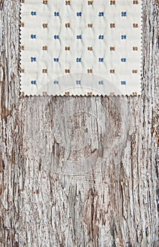 Fabric on the old wood background