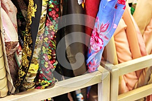 Fabric in rolls at the factory. Rolls of fabric and textiles in a factory shop